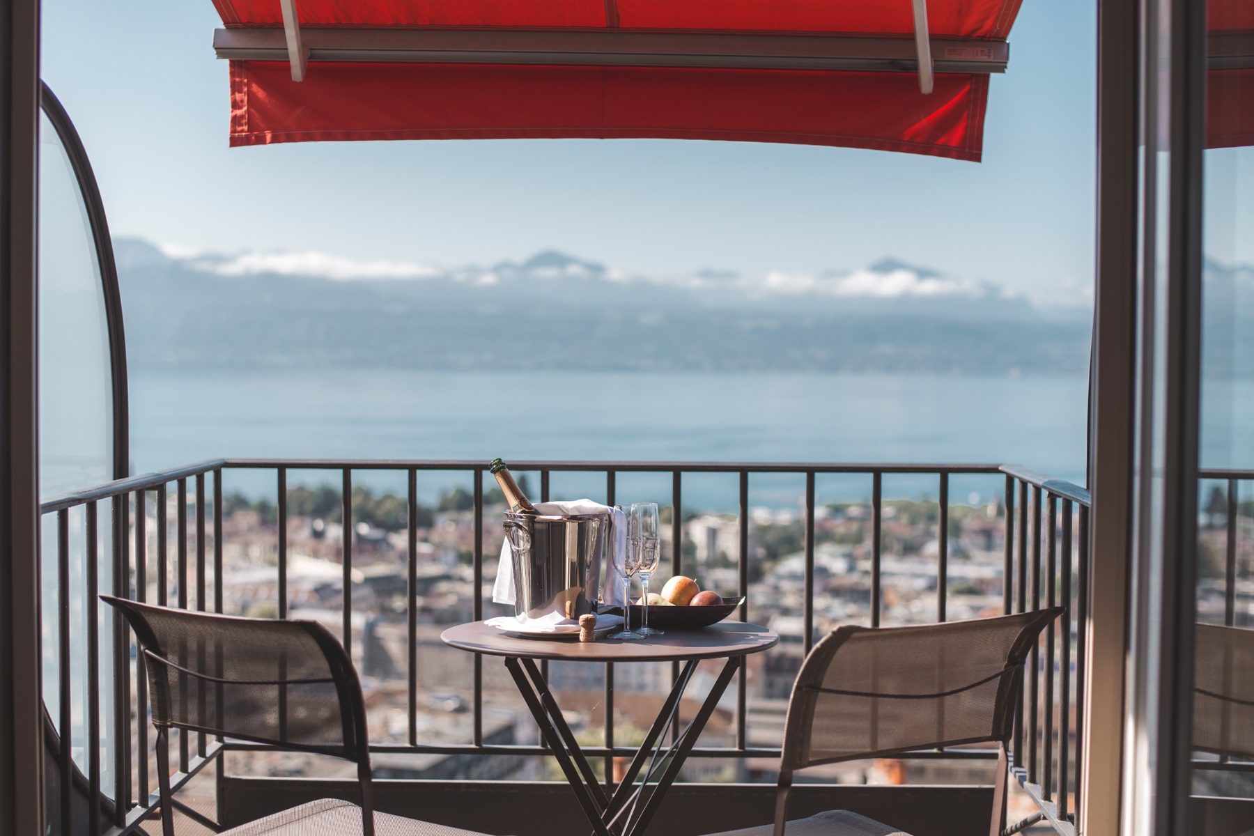 Balcony with champagne and lake view